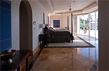 The master suite offers a king-size bed 